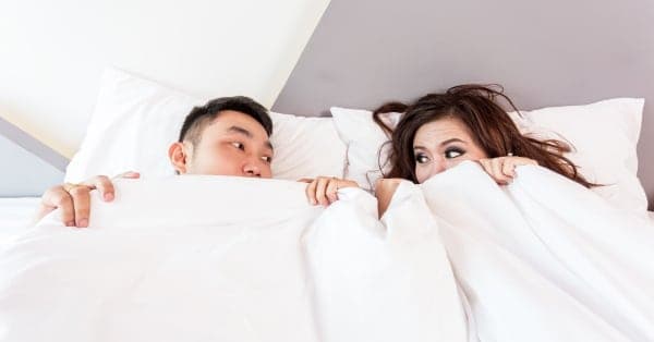 husband and wife in bed picture